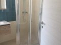 Box doccia con porta a saloon