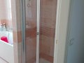 Porta a libro profilo cromato e cristallo trasparente