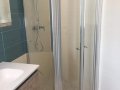 Porta a saloon con parete laterale fissa