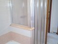 Box doccia con paretina sopramuretto